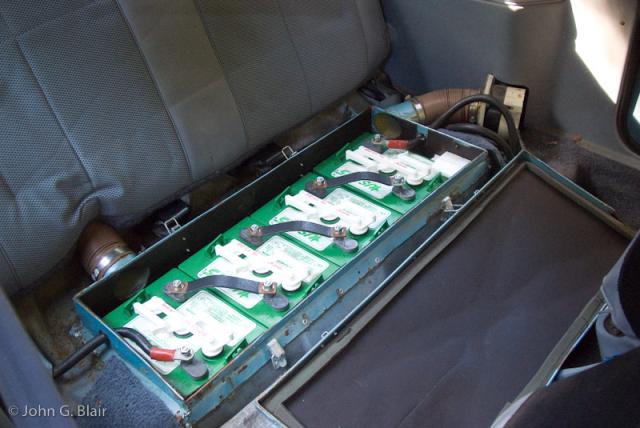 Mid vehicle battery box open